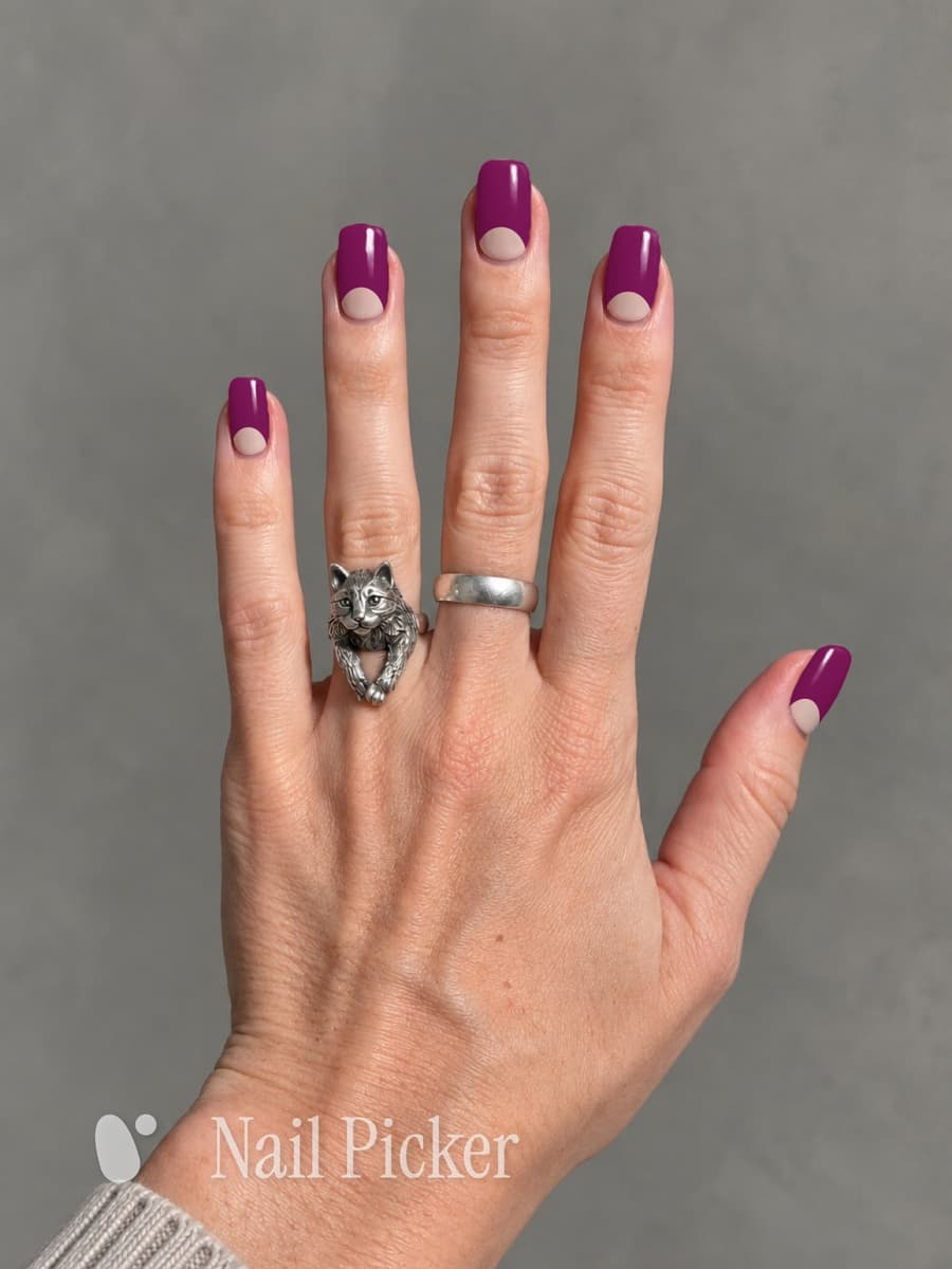 The same hand once more, a half moon this time — magenta with a bare crescent left at the cuticle.