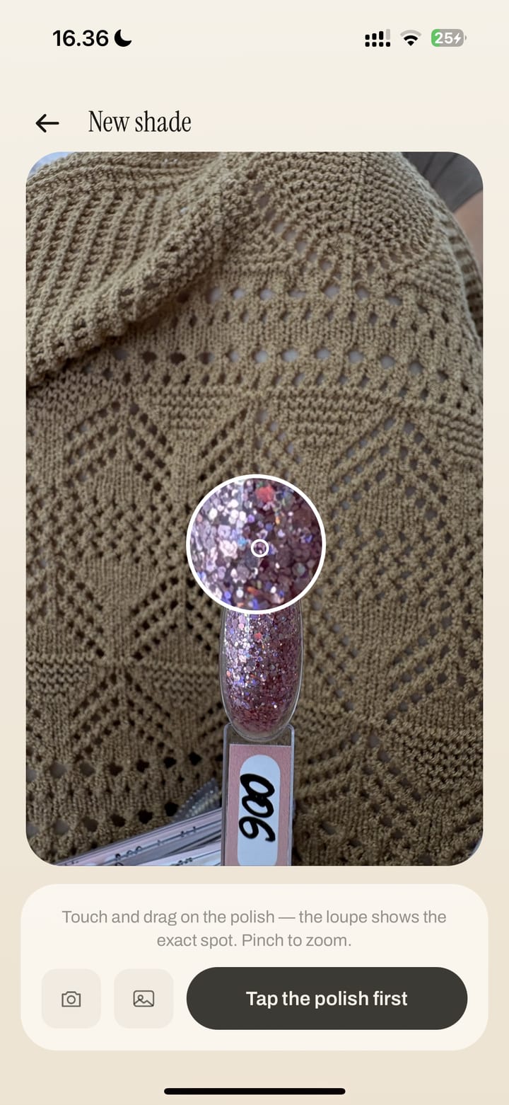 The new-shade screen: a photographed glitter swatch tip with a magnifying loupe over it, picking the exact colour out of the photo.