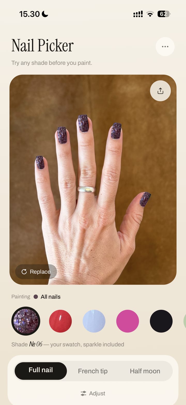 The try-on screen: the same hand wearing the glitter shade on every nail, with a row of the user's own saved swatches below.